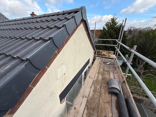 Finished roofing project with new tiles in Stockport